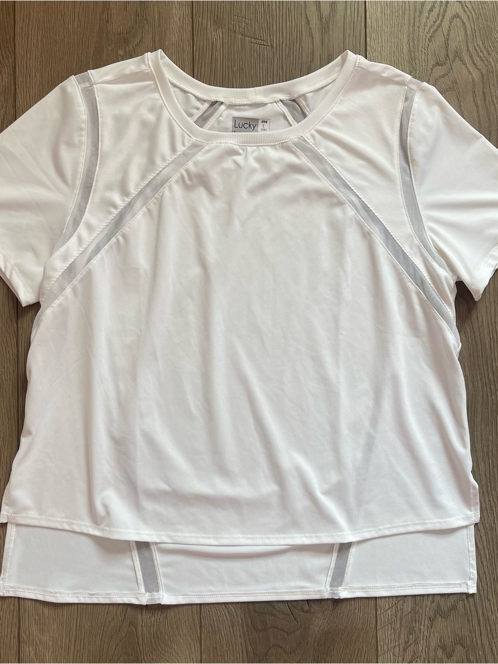 Lucky in Love Women’s Large 12 Core Mixed Up High Low White Tennis Top